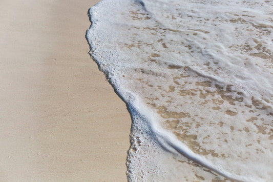 waves on a clean beach without plastic waste