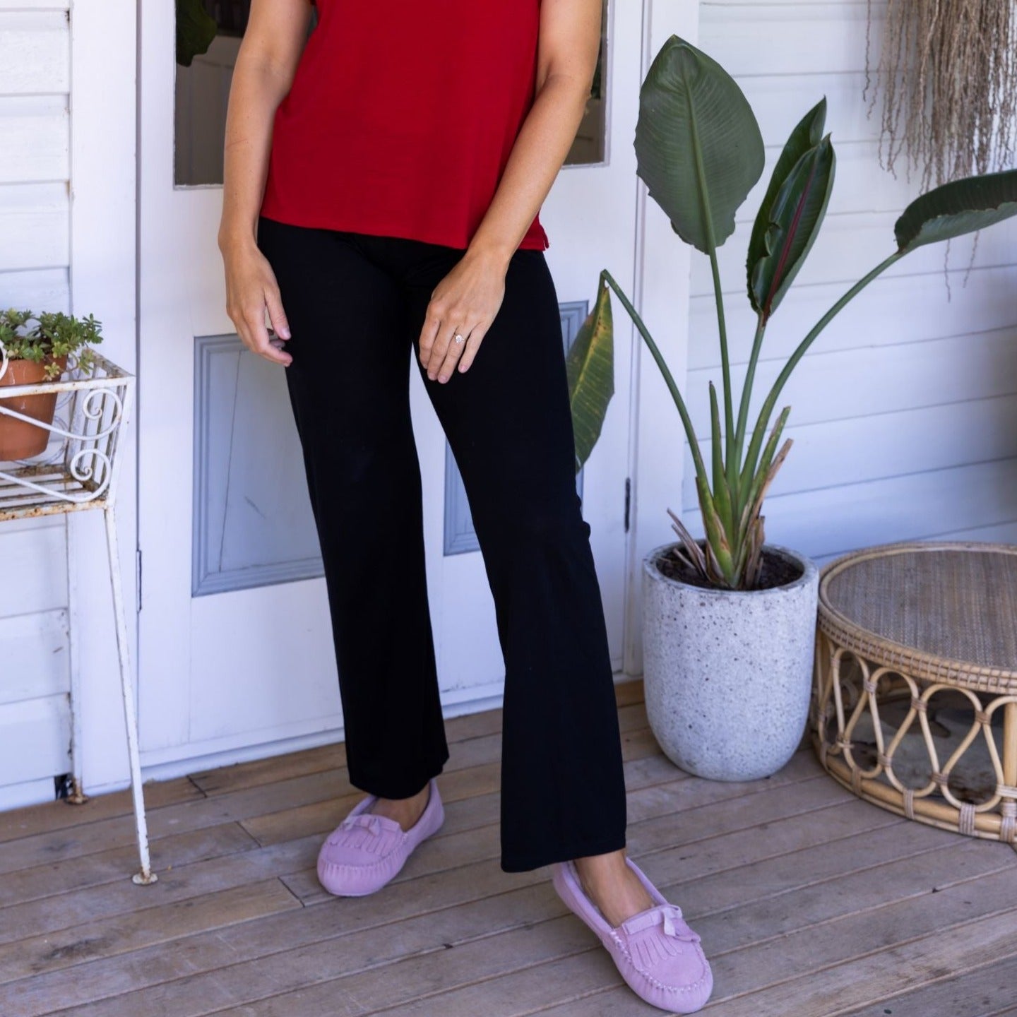 woman wearing merino pajama pants in navy